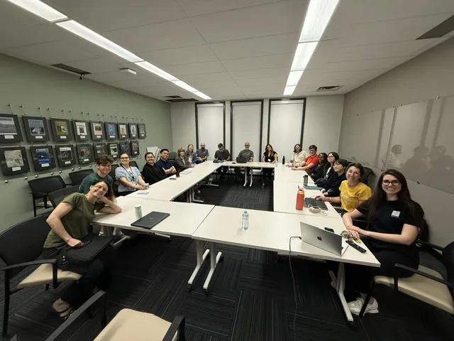 COSSEE and SORTEE members seated around a U-shaped table for Tim Parker's SORTEE birthday interview in Edmonton.